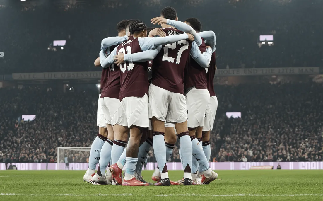 Aston Villa Players Celebrate On the Pitch
