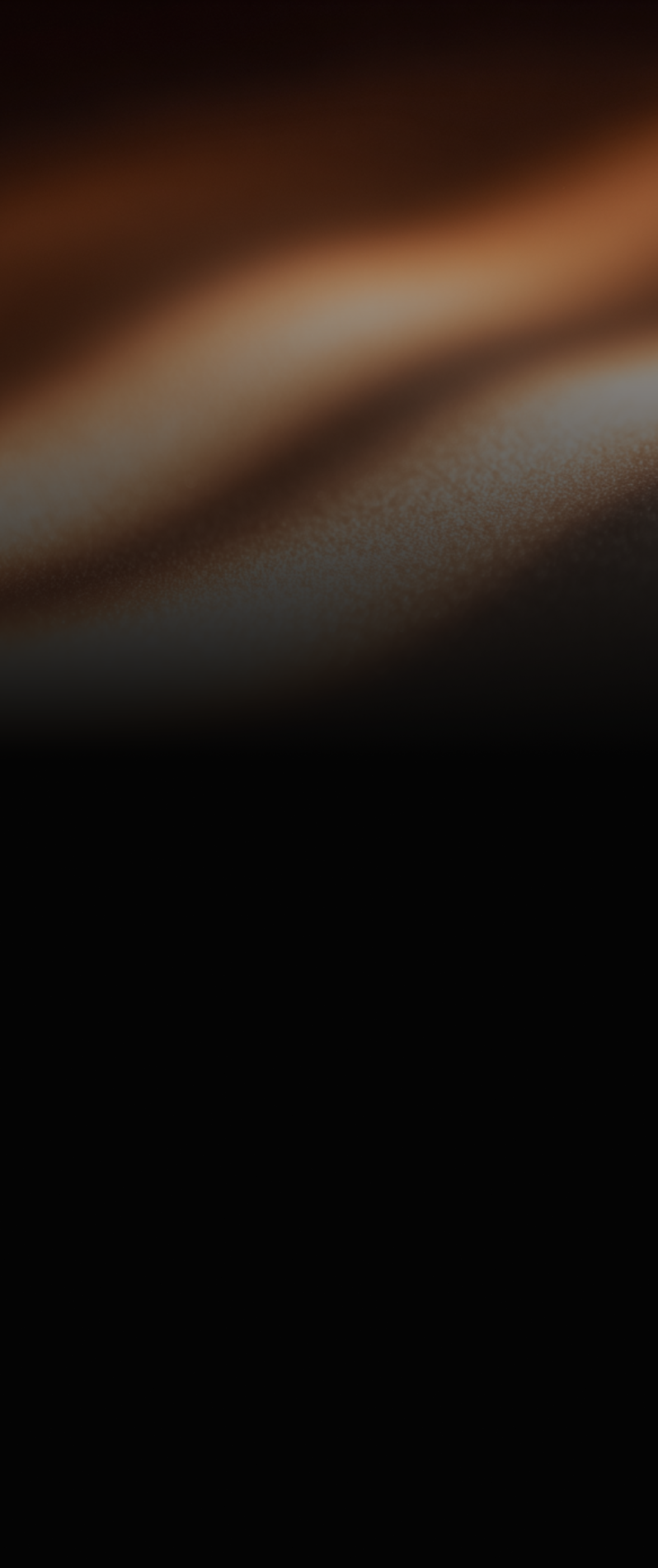 Abstract dark background featuring smooth, flowing waves of warm bronze and copper light fading into deep black shadows.