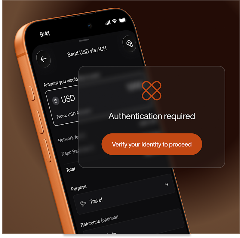 Xapo Bank mobile application user interface displaying a biometric or security verification prompt. The secure payment overlay blocks a dollar transfer transaction to enforce user identity authentication and prevent fraud.