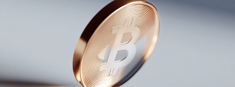 A close-up 3D render of a shiny gold Bitcoin cryptocurrency token angled forward against a soft, blurred light grey background.