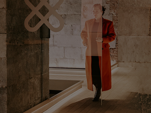 Woman walking in the Xapo Bank Head Quarters
