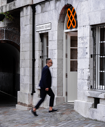 Man entering Xapo Bank Head Quarters